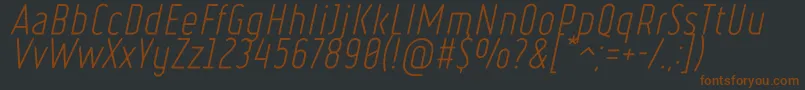 RulerLightItalic-fontti – ruskeat fontit mustalla taustalla