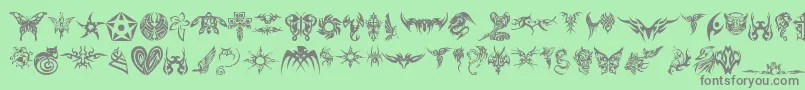 TribalTattooFont Font – Gray Fonts on Green Background