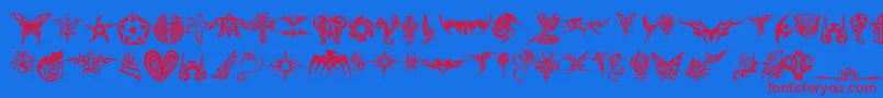 Czcionka TribalTattooFont – czerwone czcionki na niebieskim tle