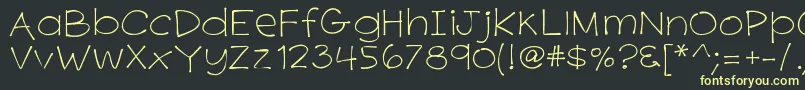 K26primrosepeach Font – Yellow Fonts on Black Background