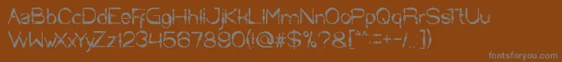 Copper-Schriftart – Graue Schriften auf braunem Hintergrund