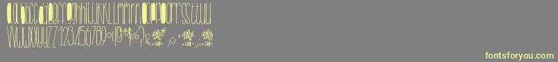 BillybopMinuskuli-Schriftart – Gelbe Schriften auf grauem Hintergrund