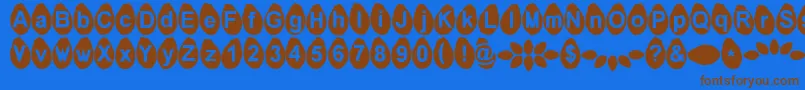 フォントMelonseeds – 茶色の文字が青い背景にあります。