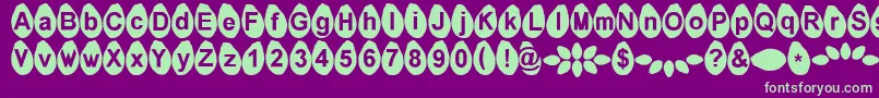 フォントMelonseeds – 紫の背景に緑のフォント