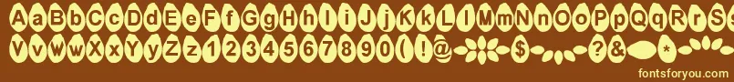 Melonseeds-fontti – keltaiset fontit ruskealla taustalla
