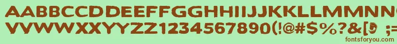 Bactosaurus Font – Brown Fonts on Green Background