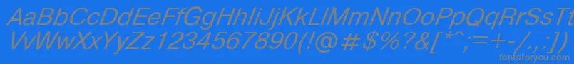 フォントHelvdlItalic – 青い背景に灰色の文字