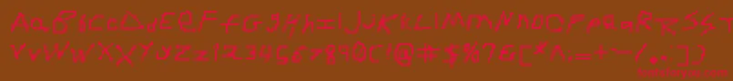 フォントRdjHandpixl – 赤い文字が茶色の背景にあります。
