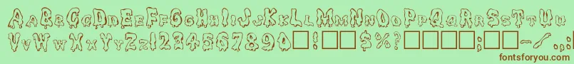 Ghouly Font – Brown Fonts on Green Background