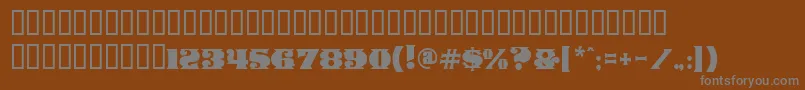Шрифт ManegeDeco – серые шрифты на коричневом фоне