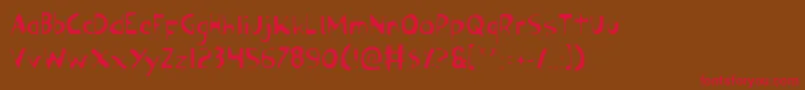 OzymandiasLight Font – Red Fonts on Brown Background