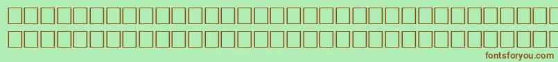 DelongbaEngraved-Schriftart – Braune Schriften auf grünem Hintergrund