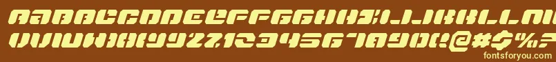 DanStargateExpandedItalic-fontti – keltaiset fontit ruskealla taustalla