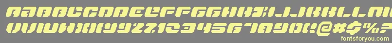 DanStargateExpandedItalic-fontti – keltaiset fontit harmaalla taustalla