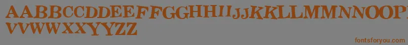 Stict-Schriftart – Braune Schriften auf grauem Hintergrund