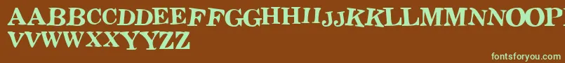 Stict Font – Green Fonts on Brown Background