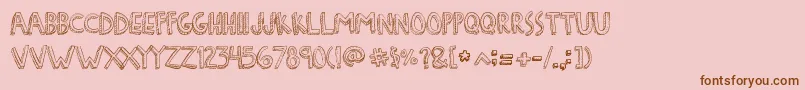 Шрифт DenneFreakshow – коричневые шрифты на розовом фоне