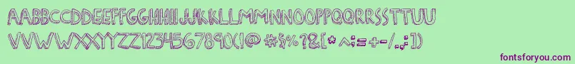 Шрифт DenneFreakshow – фиолетовые шрифты на зелёном фоне