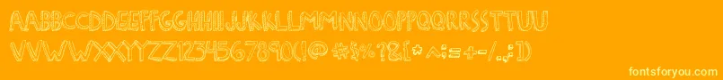 DenneFreakshow Font – Yellow Fonts on Orange Background