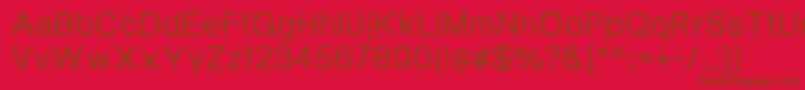NeogramMedium-fontti – ruskeat fontit punaisella taustalla