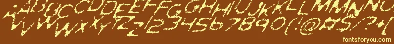 GhostlyPrintsItalic-Schriftart – Gelbe Schriften auf braunem Hintergrund