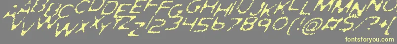 GhostlyPrintsItalic-fontti – keltaiset fontit harmaalla taustalla
