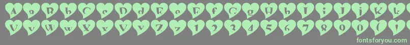 Mashyval Font – Green Fonts on Gray Background