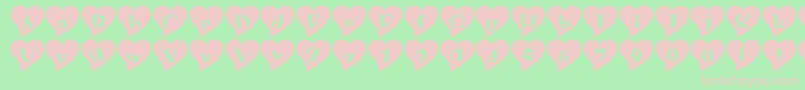 Czcionka Mashyval – różowe czcionki na zielonym tle