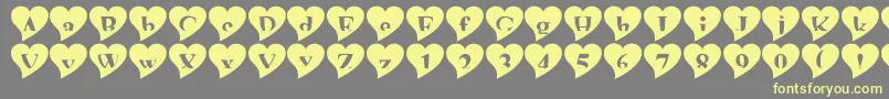 Mashyval-fontti – keltaiset fontit harmaalla taustalla