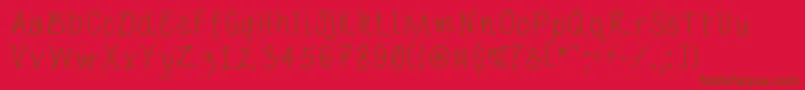 Porcelainpaperpie-Schriftart – Braune Schriften auf rotem Hintergrund