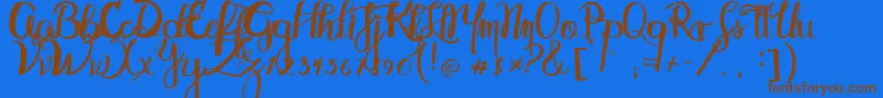 Abydos Font – Brown Fonts on Blue Background