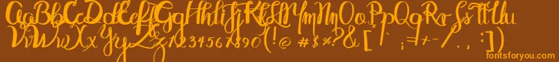 Abydos Font – Orange Fonts on Brown Background