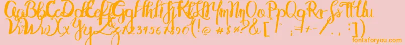 Abydos Font – Orange Fonts on Pink Background