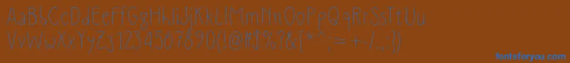 Slimamif Font – Blue Fonts on Brown Background
