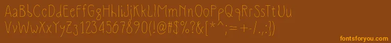 Slimamif Font – Orange Fonts on Brown Background