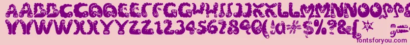 Wibbles1-Schriftart – Violette Schriften auf rosa Hintergrund