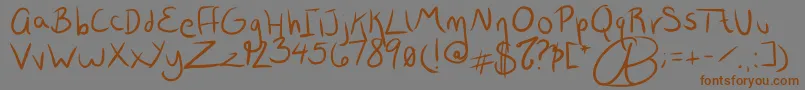 More about Wrtty Font Wrtty Font – Brown Fonts on Gray Background