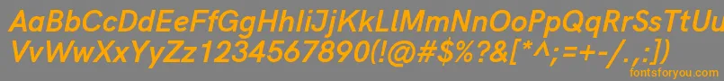 HkgroteskBoldlegacyitalic-fontti – oranssit fontit harmaalla taustalla