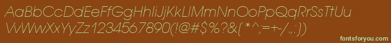 フォントAvantgardeextlititcttРљСѓСЂСЃРёРІ – 緑色の文字が茶色の背景にあります。