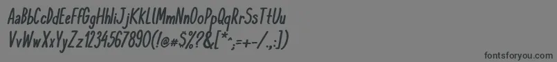 KomixconBoldItalic Font – Black Fonts on Gray Background