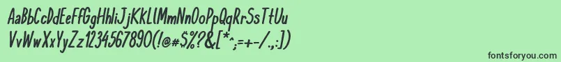 フォントKomixconBoldItalic – 緑の背景に黒い文字