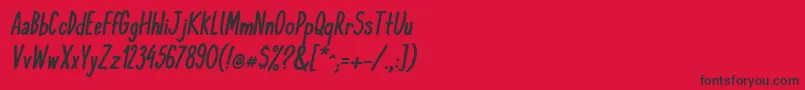 フォントKomixconBoldItalic – 赤い背景に黒い文字