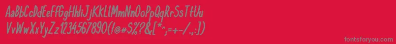 KomixconBoldItalic Font – Gray Fonts on Red Background