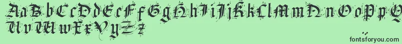 Czcionka SatanasHumanumSalvator – czarne czcionki na zielonym tle
