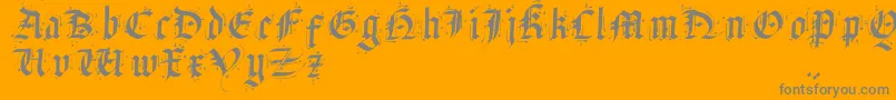 SatanasHumanumSalvator-Schriftart – Graue Schriften auf orangefarbenem Hintergrund