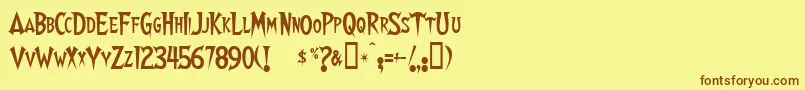 フォントWalshes – 茶色の文字が黄色の背景にあります。