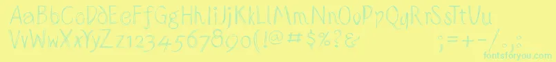 フォントSketchedalphabet – 黄色い背景に緑の文字