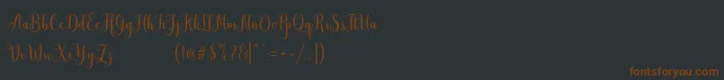 fuente MudhisaScriptDemo – Fuentes Marrones Sobre Fondo Negro