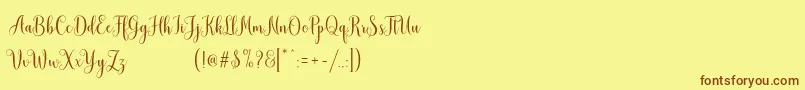 MudhisaScriptDemo Font – Brown Fonts on Yellow Background