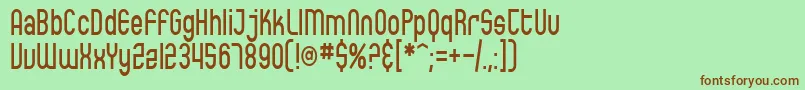 SfEccentricOpusCondensed-fontti – ruskeat fontit vihreällä taustalla